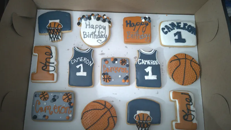 Basketball birthday cookies: jerseys, basketballs and a number one